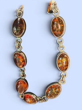 Sterling Silver Baltic Amber Bracelet
Oval shaped Cabochon Stones VTG